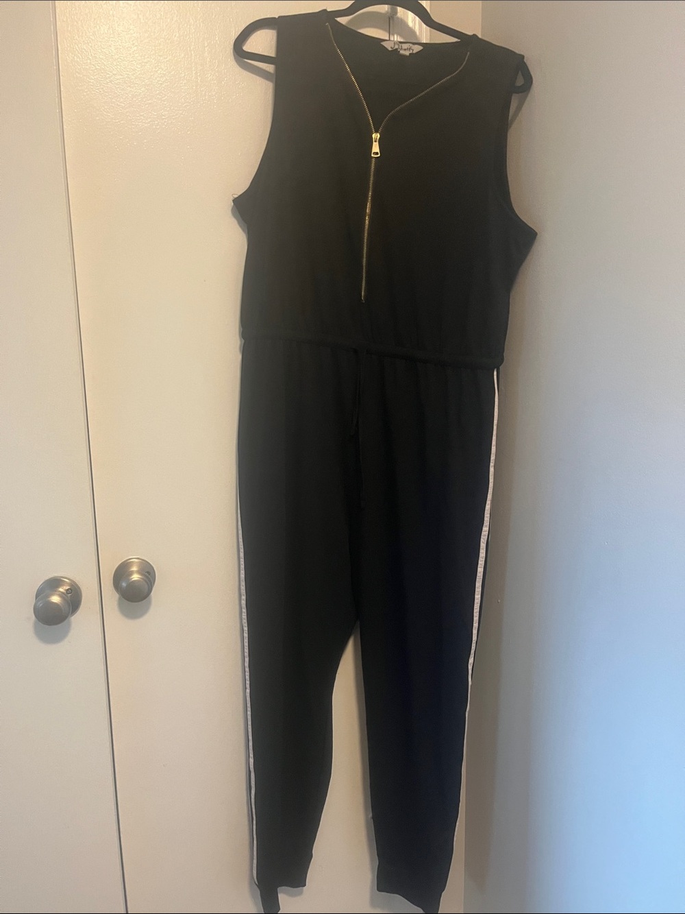 Sleeveless Black Jumpsuit with Side Stripe and Zip